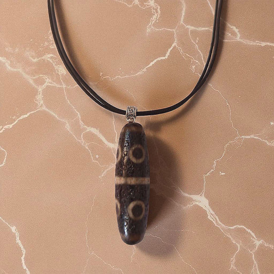 Tibetan Dzi Bead “9 Eyes” — Pendant